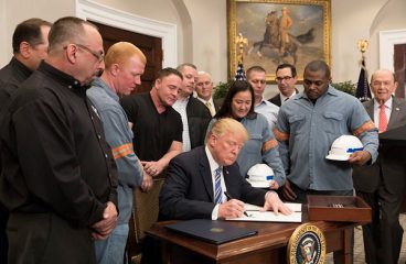 Donald J. Trump signs the Section 232 Proclamations on steel and aluminum imports (tariffs). Photo: Joyce N. Boghosia / The White House (Public domain).