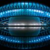 Foto del edificio L’Hemisferic, diseñado por Santiago Calatrava con analogía de un ojo, de noche en la Ciudad de las Artes y las Ciencias de Valencia (España). El edificio está iluminado con luces blancas con filtros azules, dando una idea futurista y distópica.