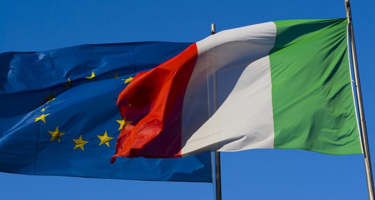 Italy’s budget battle with the European Commission.Flags of Italy and the European Union