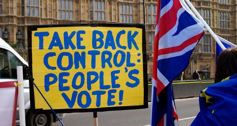 Listen to the people and revoke Article 50. People's Vote banner in Westminster, London. Photo: ChiralJon (CC BY 2.0).