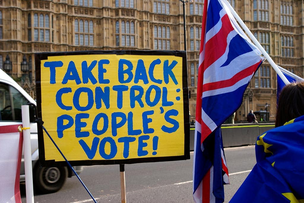 Listen to the people and revoke Article 50. People's Vote banner in Westminster, London. Photo: ChiralJon (CC BY 2.0).