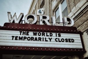 Facing the possibility of a long pandemic. Old movie theater sign. Photo: Old movie theater sign. Photo: Edwin Hooper.