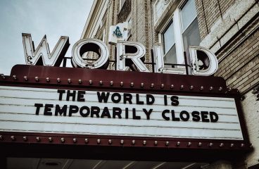 Facing the possibility of a long pandemic. Old movie theater sign. Photo: Old movie theater sign. Photo: Edwin Hooper.