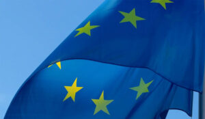 European Union (EU) flag flying on a flagpole