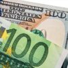 Ley de Reducción de la Inflación. Billetes de cien dólares y cien euros