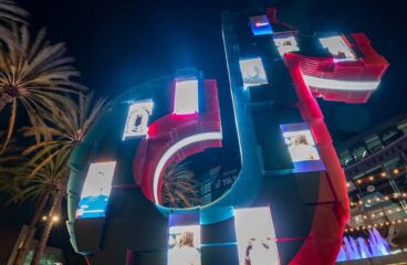 TikTok logo statue with mobile video projections at the VidCon 2022 at the Anaheim Convention Center (USA)