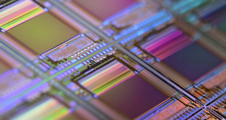 A macro of a silicon wafer. Each square is a chip with microscopic transistors and circuits. Silicon is one of the most widely used semiconductors.