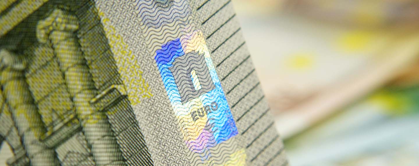 Close-up of the edge of a five-euro banknote. Economic security