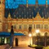 Image of the Peace Palace at night in The Hague (Netherlands), seat of the International Court of Justice. The ICJ is the principal judicial body of the United Nations