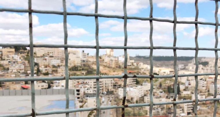 Views of Bethlehem through the fences in the West Bank, Palestine.