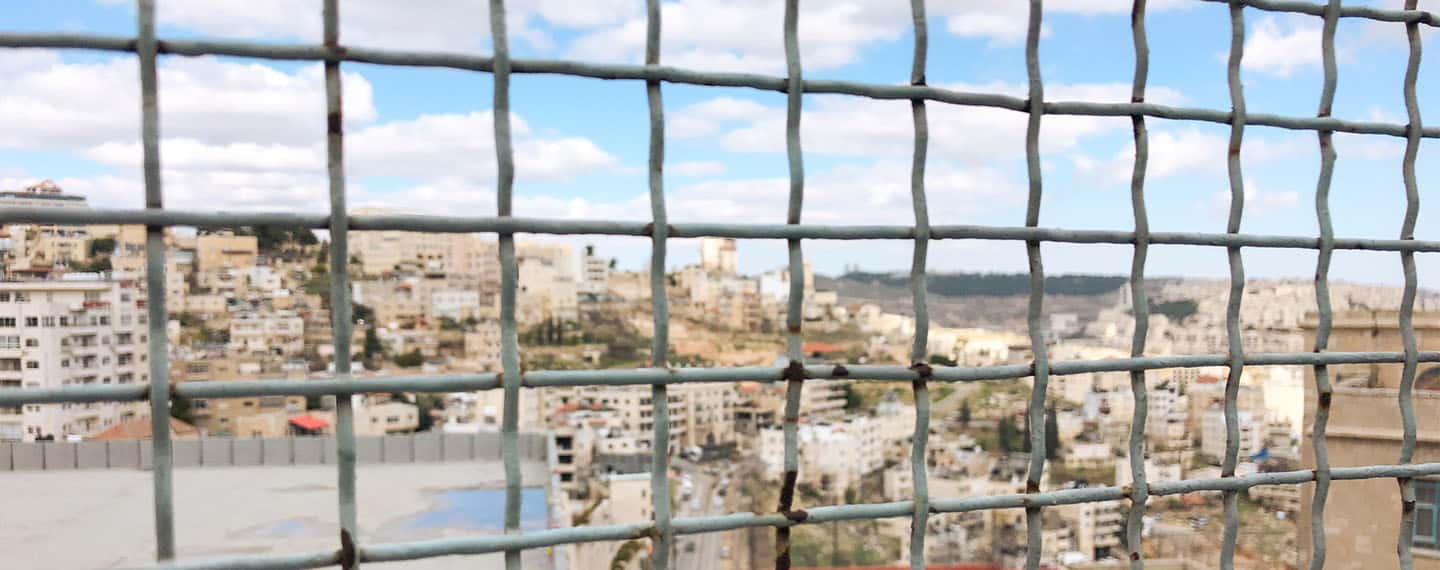 Views of Bethlehem through the fences in the West Bank, Palestine.