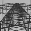 Electrical transmission tower from low angle. Geopolitics of the global energy