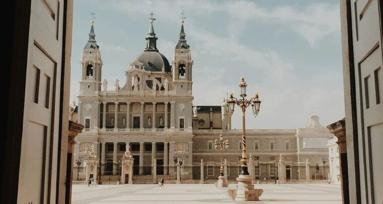 Open door with a view of the Almudena Cathedral. Madrid