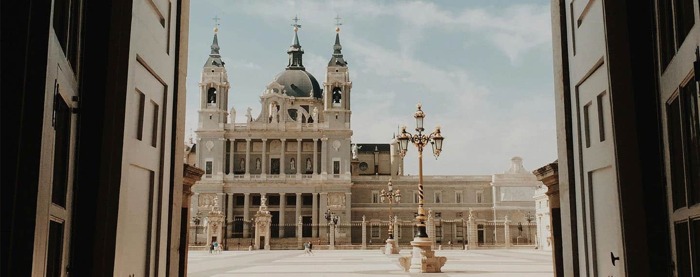 Open door with a view of the Almudena Cathedral. Madrid