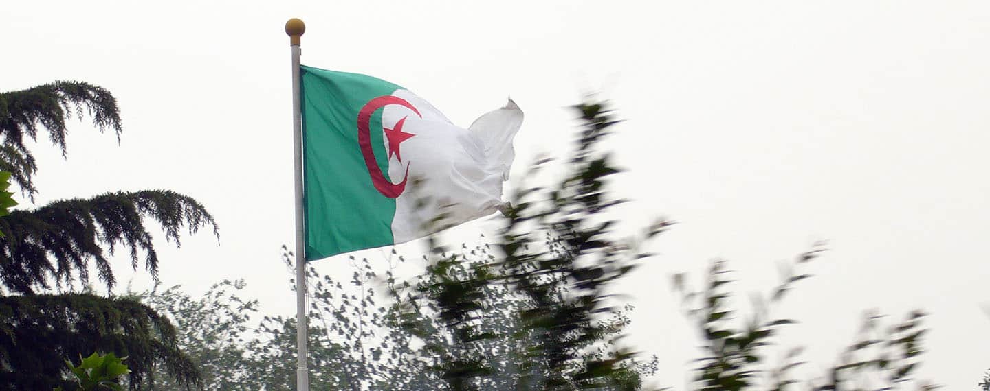 : Algerian flag flying in front of the Algerian embassy in Dongzhimen, Beijing. Algeria