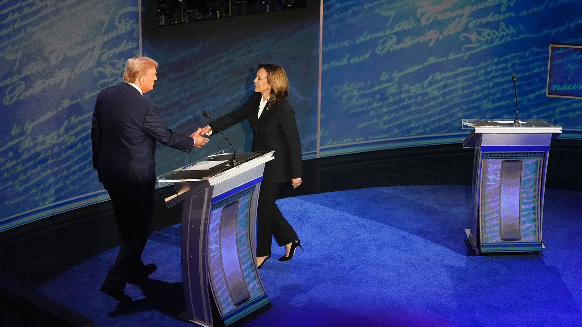 Vice President and Democratic presidential candidate Kamala Harris and former President and Republican presidential candidate Donald Trump shake hands before the presidential debate at the National Constitution Center in Philadelphia, Pennsylvania, 10 September 2024. US Elections