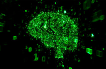 Visualización digital de un cerebro con luces verdes formadas por números binarios flotantes en un fondo oscuro. La imagen representa la inteligencia artificial y el procesamiento de datos. Inteligencia artificial