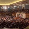 View of the floor of the US Congress during the 2018 State of the Union address, with the president at the podium facing lawmakers. Donald Trump