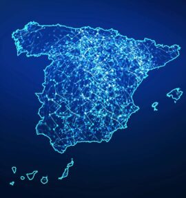 Ilustración vectorial del mapa de España con una red de conexiones iluminadas en azul claro, con un fondo en un gradiente de color entre azul marino y negro