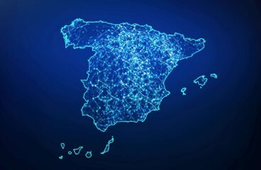 Ilustración vectorial del mapa de España con una red de conexiones iluminadas en azul claro, con un fondo en un gradiente de color entre azul marino y negro