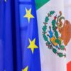 Flags of the European Union (blue with a circle of yellow stars) and Mexico (tricolour with green, white, and red stripes, featuring a coat of arms with an eagle and a serpent) at the 25th Meeting of the Mexico-European Union Joint Parliamentary Committee in 2018. Mexico