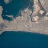 Overhead satellite view of Aden (Yemen), showing a top-down perspective of the city’s natural harbour. Houthi