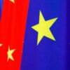A row of European Union flags (blue with yellow stars) and Chinese flags (red with yellow stars) waving side by side during the 2020 EU–China summit. China