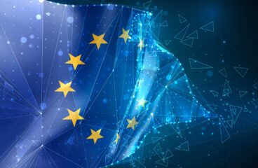 Bandera de la Unión Europea en representación vectorial 3D, compuesta por polígonos triangulares y redes digitales sobre fondo azul. Derecho digital