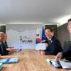Six people in formal attire sit around a wooden table in a conference room at the G7 Summit in Canada on 17 June 2025. In the background, a sign with the text “G7 + 2025 Kananaskis” and the flags of the Republic of Korea and the European Union. Among those attending the meeting: Lee-Jae Myung (President of the Republic of Korea, second on the right), Ursula von der Leyen (President of the European Commission, first on the left) and Antonio Costa (President of the European Council, second on the left).