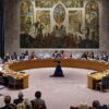 Members of the UN Security Council gathered around a circular table in the conference room with a mural in the background, to discuss the Women, Peace and Security Agenda (New York, 2022).