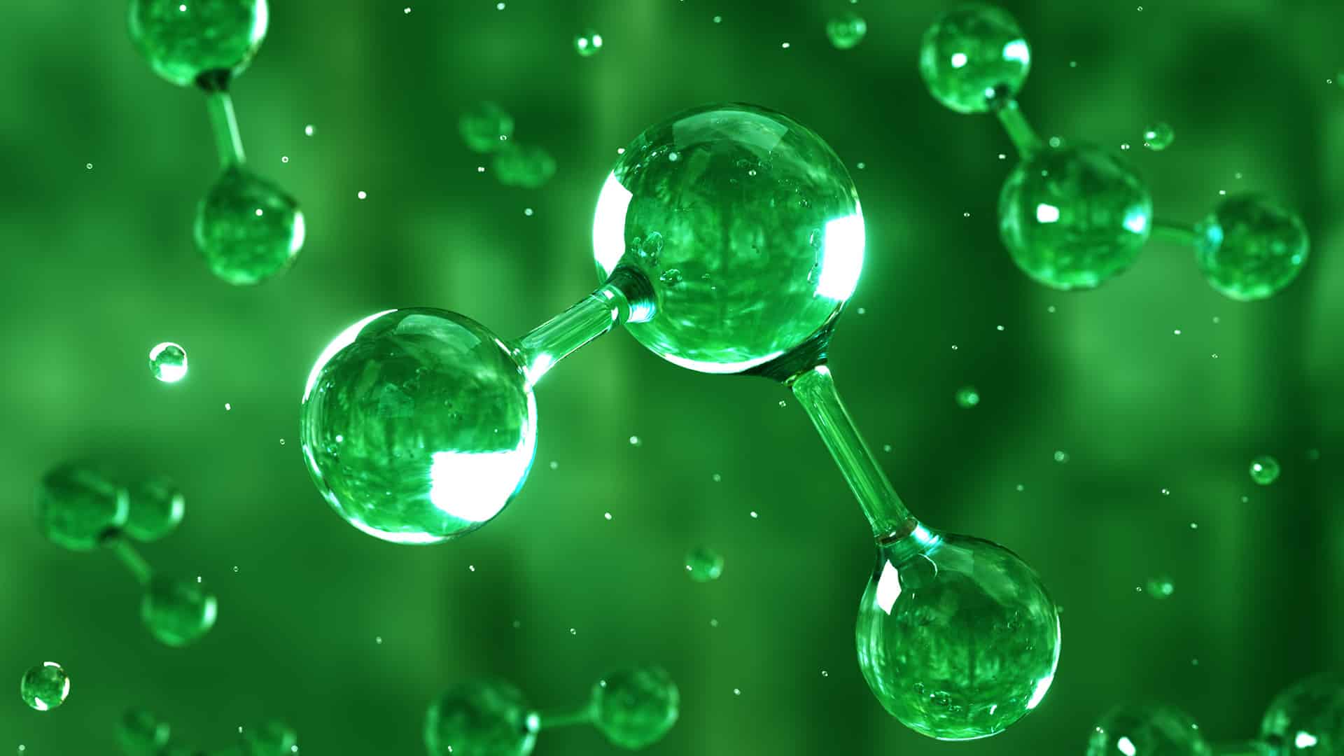 Digital generated image of H2 hydrogen molecule made out of liquid on green background.