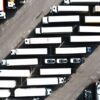 Aerial view of lorries and trailers parked at a logistics hub in Llinars del Vallès, Barcelona, Spain.